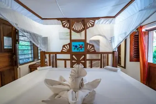 Quarto apresentado na galeria do Blue Oyster Hotel, em Jambiani